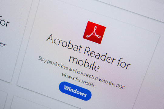 Ryazan, Russia - July 11, 2018: Adobe Acrobat Reader for mobile, software logo on the official website of Adobe.
