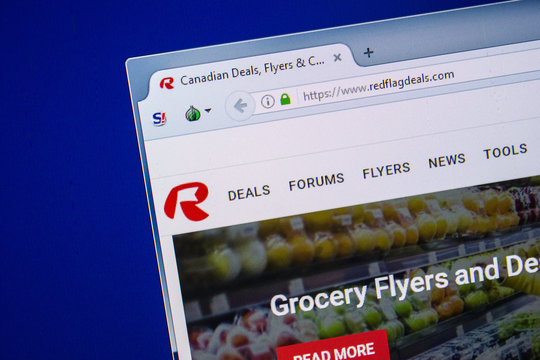 Ryazan, Russia - July 24, 2018: Homepage of RedFlagDeals website on the display of PC. Url - RedFlagDeals.com .