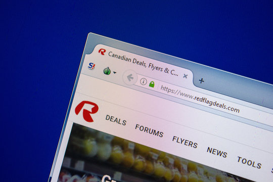 Ryazan, Russia - July 24, 2018: Homepage of RedFlagDeals website on the display of PC. Url - RedFlagDeals.com .