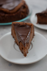 home made sweet chocolate cheesecake on a wooden table