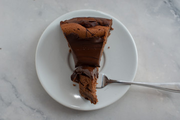 home made sweet chocolate cheesecake on a wooden table