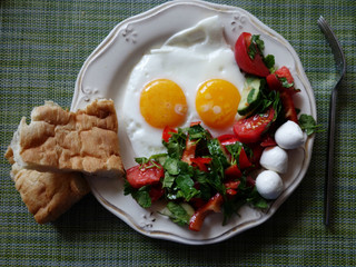 lovely morning Breakfast bread on a white plate on a light green background