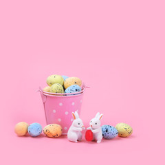 Happy Easter. bunny toy and egg on pink background. Easter holiday concept, spring season. festive idea, minimal modern style. copy space