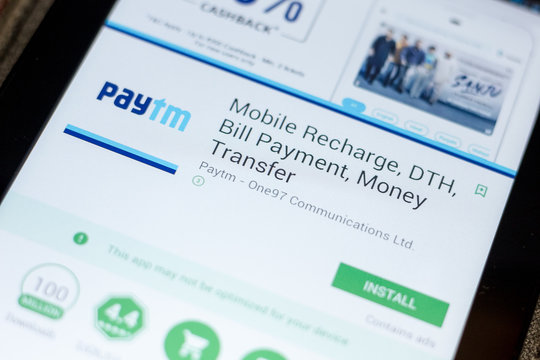 Ryazan, Russia - July 03, 2018: PayTm Mobile Recharge, DTH, Bill Payment, Money Transfer mobile app on the display of tablet PC.