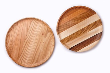 Wooden plates on a white background