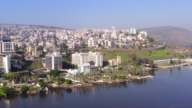 Aerial footage of Tiberias, Israel. with the sea of Galilee on a clear day.