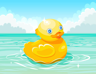 Yellow duck floating on the water surface