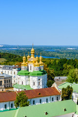 Fototapeta na wymiar View on Church of all Saints of the Kiev Pechersk Lavra, river Dnieper and Kiev cityscape