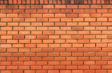  weathered red brick wall