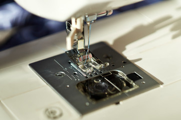 Close-up of sewing machine and sewing needle