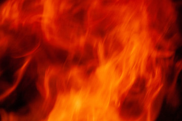 Texture of fire. Orange bright flame. Photo of a burning bonfire in a fire.