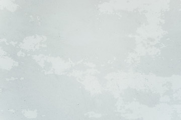 White abstract background. Textured plaster wall. Grainy, stained effect.