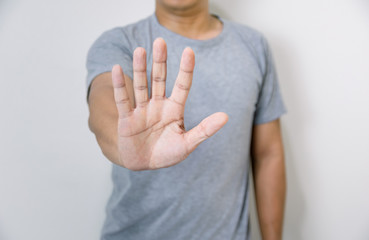 Stop concept a man showing hand making