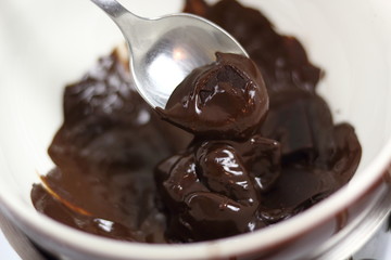 Melting chocolate over pan of simmering water. Making Chocolate, Pear and Pecan Pie Series.