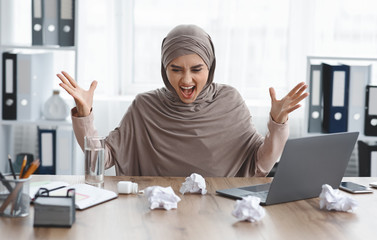 Stressed Arabic Woman Office Employee Having Nervous Breakdown At Work
