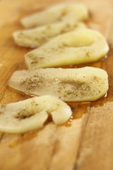 Cooked pear slices on cutting board. Making Chocolate, Pear and Pecan Pie Series.