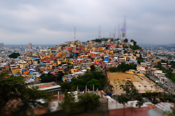 Selective focus, miniature by Tilt-shift. view to colorful houses on Santa Ana hill in Guayaquil, Ecuador. Selective focus