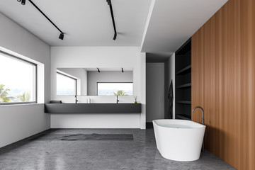 Fototapeta na wymiar White and wooden bathroom with tub and sink