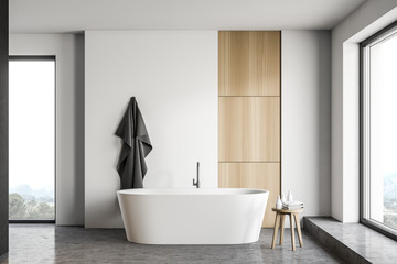 Fototapeta na wymiar White and wooden bathroom interior with tub