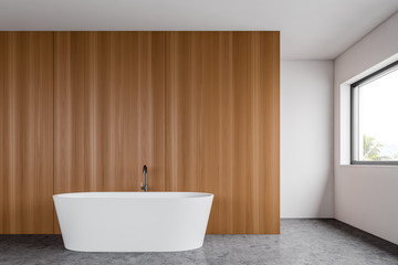 Obraz na płótnie Canvas White and wooden bathroom interior with tub