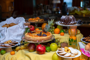 Restaurant breakfast menu with various cakes.