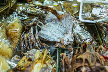 Heap of typical chinese dried fish at the Singapore night market in China Town