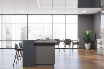 Panoramic gray kitchen with bar and table