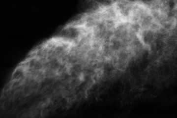 A stream of water and a cloud of drops