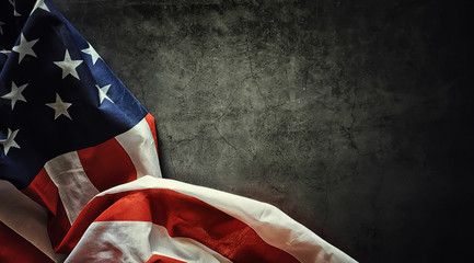 American flag on a black background. Space for text.