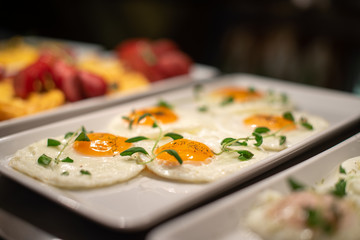 Restaurant breakfast menu with various cakes.