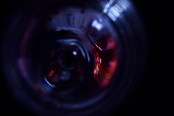  glass bottom on black background