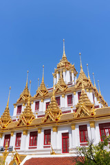 Fototapeta premium Loha Prasat or iron monastery at Wat Ratchanatdaram temple, on Ratchadamnoen avenue, Bangkok, Thailand