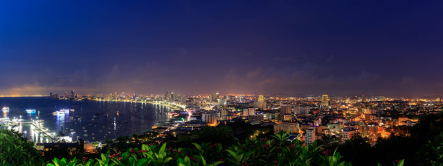 Pattaya bay and Bali Hai Pier, from Phra Tamnak Mountain viewpoint, during twilight, Chonburi, Thailand; panorama