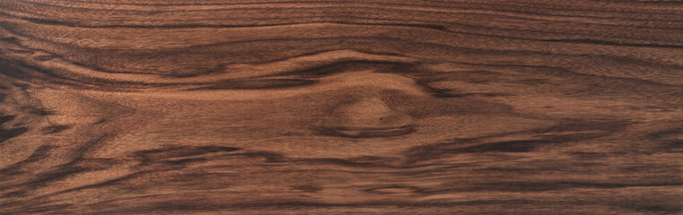 Texture of black walnut board with oil finish