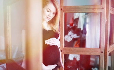 Pregnant young beautiful girl on the ninth month