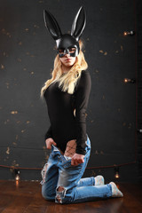 A girl in a black mask