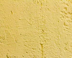 Decorative yellow plaster, texture texture of the wall.Finishing facilities.