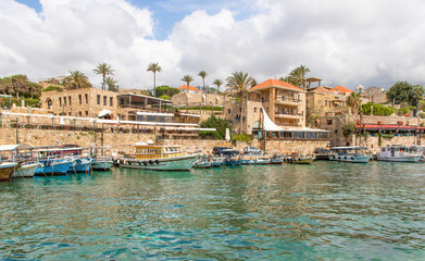 Naklejka premium Byblos, Lebanon - one of the oldest continuously inhabited cities in the world, and UNESCO World Heritage Site, the Old Town of Byblos displays a wonderful harbour, once used by Romans and Phoenicians