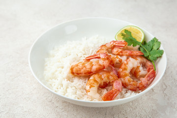 Prawn and rice on white bowl