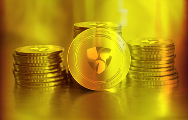 Nem (XEM) digital crypto currency. Stack of golden coins. Cyber money. - 321802003