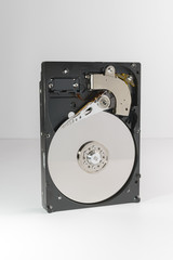 Computer hard drive. Open hard disk storage. Disassembled hard drive, hdd with mirror effect. Repair or recovery information from broken HDD