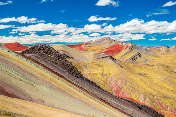 Stunning view at Palccoyo rainbow mountain (Vinicunca alternative), mineral colorful stripes in Andean valley, Cusco, Peru, South America