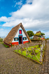 Traditional historic thatched houses with strawy roofs on Madeira island, Santana, Portugal