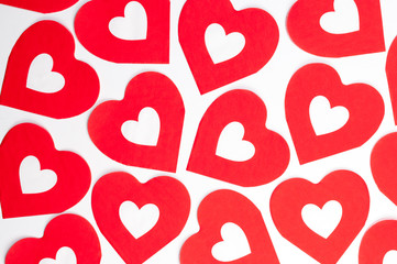 Full frame Valentine's Day background of red and white hearts aligning
