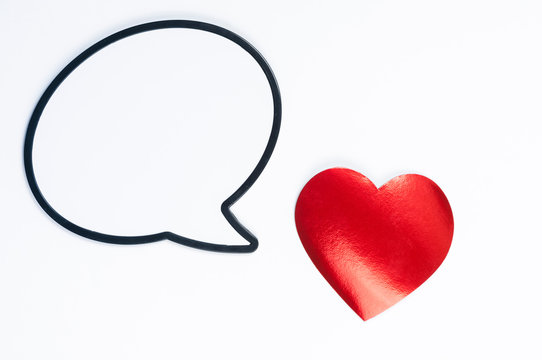 Shiny red heart with a blank speech bubble for Valentine's Day message on white background