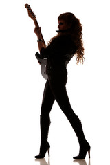Naklejka premium Silhouette of girl with guitar in hands