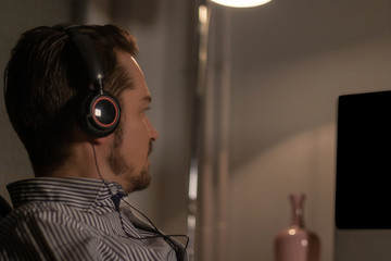 Close-up of computer programmer working late in the office.