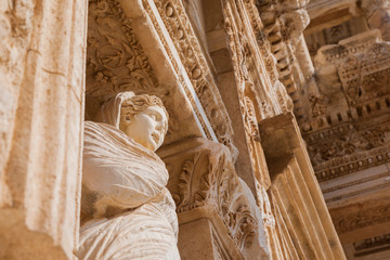 Figurine in Library of Celsus, ruins of ancient city Ephesus