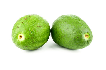 Green ripe Avocado (Persea americana,alligator pear) isolated on white background. Healthy food concept