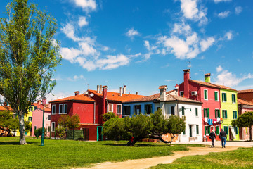 Fototapeta na wymiar Street with colorful houses on Burano island, Venice, Italy